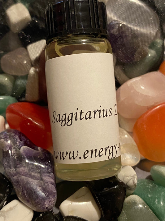 Sagittarius Zodiac Magical  Oil 10ml Bottle. - With crystals, herbs and roots.